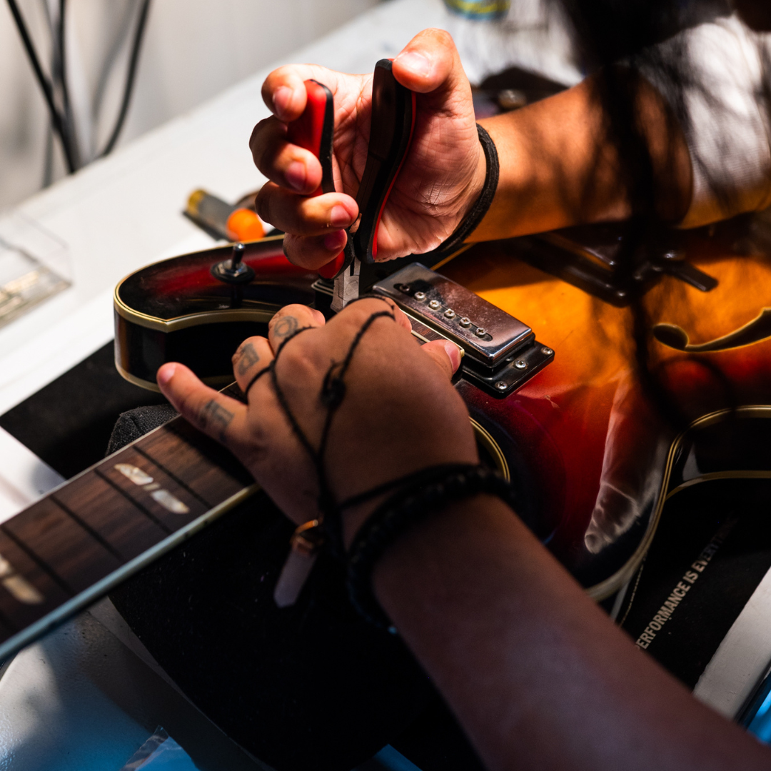 Sky Music Guitar Technician at Work