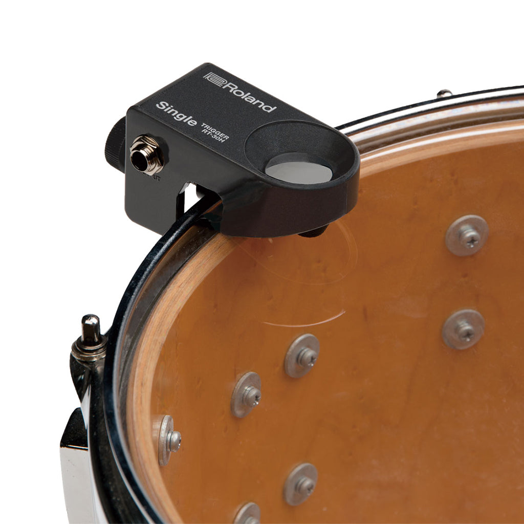 Acoustic drum outlet trigger